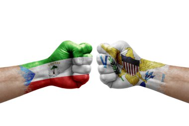 Two hands punch to each others on white background. Country flags painted fists, conflict crisis concept between equatorial guinea and virgin islands