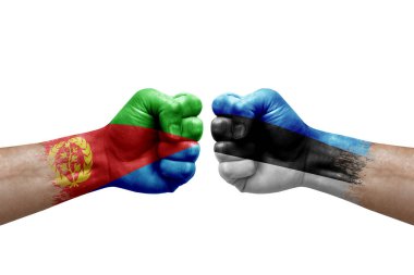Two hands punch to each others on white background. Country flags painted fists, conflict crisis concept between eritrea and estonia