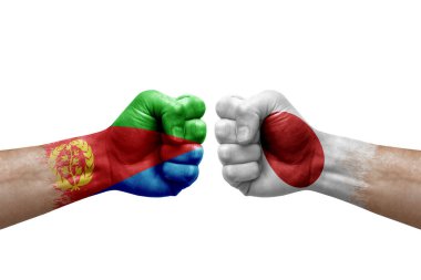 Two hands punch to each others on white background. Country flags painted fists, conflict crisis concept between eritrea and japan