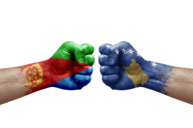 Two hands punch to each others on white background. Country flags painted fists, conflict crisis concept between eritrea and kosovo