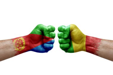 Two hands punch to each others on white background. Country flags painted fists, conflict crisis concept between eritrea and mali