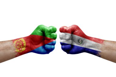 Two hands punch to each others on white background. Country flags painted fists, conflict crisis concept between eritrea and paraguay