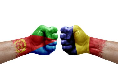 Two hands punch to each others on white background. Country flags painted fists, conflict crisis concept between eritrea and romania