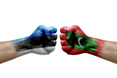 Two hands punch to each others on white background. Country flags painted fists, conflict crisis concept between estonia and maldives