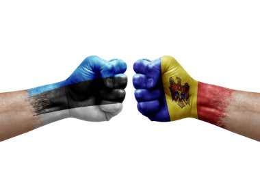 Two hands punch to each others on white background. Country flags painted fists, conflict crisis concept between estonia and moldova
