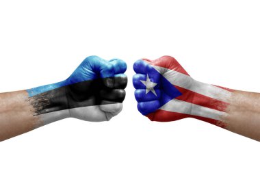 Two hands punch to each others on white background. Country flags painted fists, conflict crisis concept between estonia and puerto rico