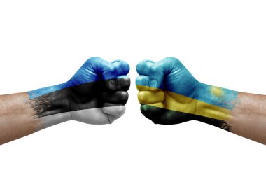 Two hands punch to each others on white background. Country flags painted fists, conflict crisis concept between estonia and rwanda