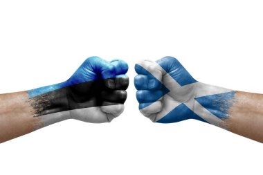 Two hands punch to each others on white background. Country flags painted fists, conflict crisis concept between estonia and scotland