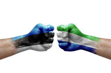 Two hands punch to each others on white background. Country flags painted fists, conflict crisis concept between estonia and sierra leone