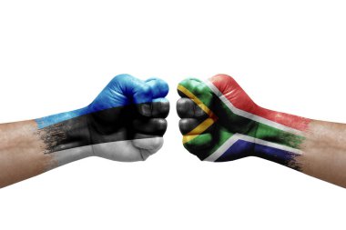 Two hands punch to each others on white background. Country flags painted fists, conflict crisis concept between estonia and south africa