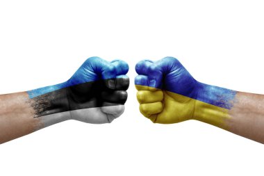Two hands punch to each others on white background. Country flags painted fists, conflict crisis concept between estonia and ukraine