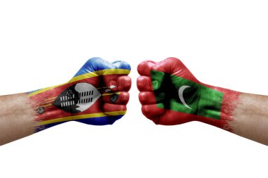 Two hands punch to each others on white background. Country flags painted fists, conflict crisis concept between eswatini and maldives