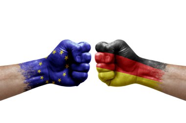 Two hands punch to each others on white background. Country flags painted fists, conflict crisis concept between european union and germany