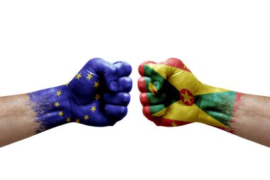 Two hands punch to each others on white background. Country flags painted fists, conflict crisis concept between european union and grenada