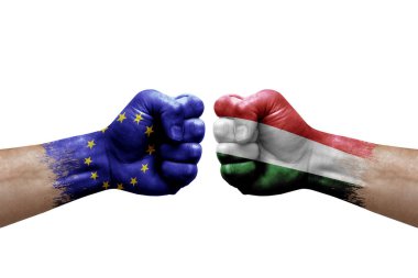 Two hands punch to each others on white background. Country flags painted fists, conflict crisis concept between european union and hungary