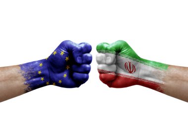 Two hands punch to each others on white background. Country flags painted fists, conflict crisis concept between european union and iran