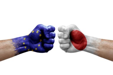 Two hands punch to each others on white background. Country flags painted fists, conflict crisis concept between european union and japan
