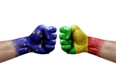Two hands punch to each others on white background. Country flags painted fists, conflict crisis concept between european union and mali