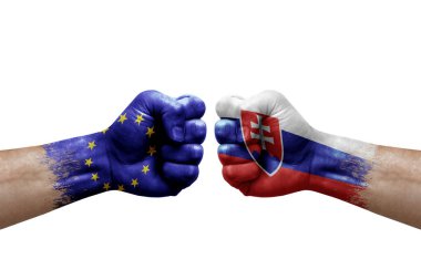 Two hands punch to each others on white background. Country flags painted fists, conflict crisis concept between european union and slovakia