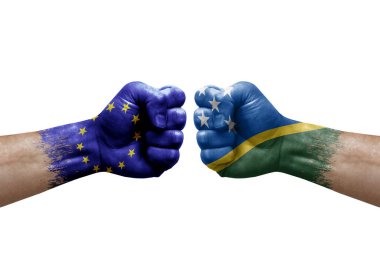 Two hands punch to each others on white background. Country flags painted fists, conflict crisis concept between european union and solomon islands