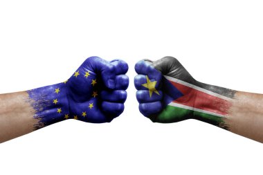 Two hands punch to each others on white background. Country flags painted fists, conflict crisis concept between european union and south sudan