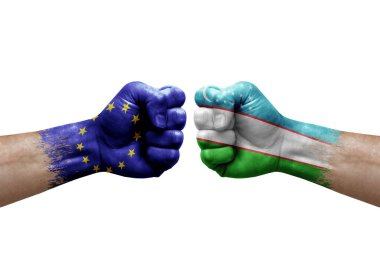 Two hands punch to each others on white background. Country flags painted fists, conflict crisis concept between european union and uzbekistan
