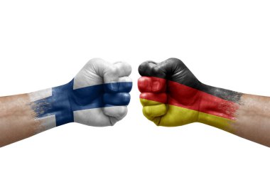 Two hands punch to each others on white background. Country flags painted fists, conflict crisis concept between finland and germany