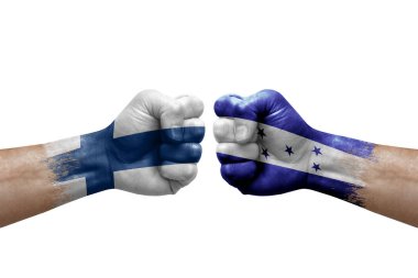Two hands punch to each others on white background. Country flags painted fists, conflict crisis concept between finland and honduras