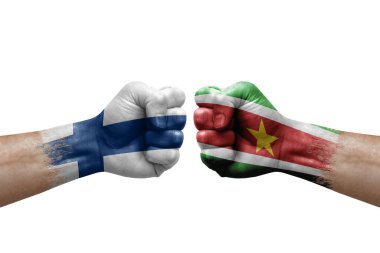 Two hands punch to each others on white background. Country flags painted fists, conflict crisis concept between finland and suriname