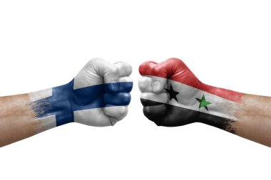Two hands punch to each others on white background. Country flags painted fists, conflict crisis concept between finland and syria