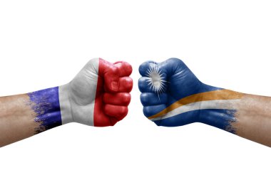 Two hands punch to each others on white background. Country flags painted fists, conflict crisis concept between france and marshall islands