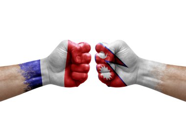Two hands punch to each others on white background. Country flags painted fists, conflict crisis concept between france and nepal