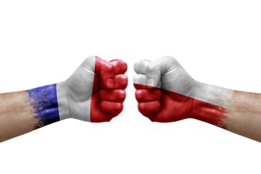 Two hands punch to each others on white background. Country flags painted fists, conflict crisis concept between france and poland