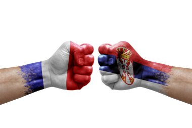 Two hands punch to each others on white background. Country flags painted fists, conflict crisis concept between france and serbia