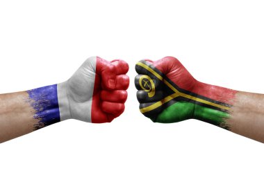 Two hands punch to each others on white background. Country flags painted fists, conflict crisis concept between france and vanuatu