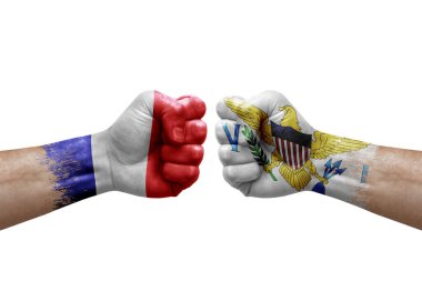 Two hands punch to each others on white background. Country flags painted fists, conflict crisis concept between france and virgin islands