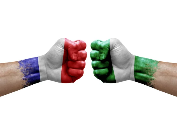 Two Hands Punch Each Others White Background Country Flags Painted — Stock fotografie