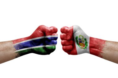Two hands punch to each others on white background. Country flags painted fists, conflict crisis concept between gambia and peru