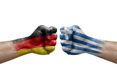 Two hands punch to each others on white background. Country flags painted fists, conflict crisis concept between germany and greece
