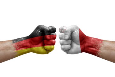 Two hands punch to each others on white background. Country flags painted fists, conflict crisis concept between germany and malta