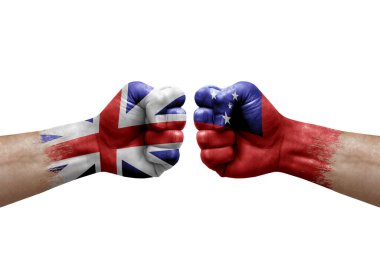 Two hands punch to each others on white background. Country flags painted fists, conflict crisis concept between great britain and samoa