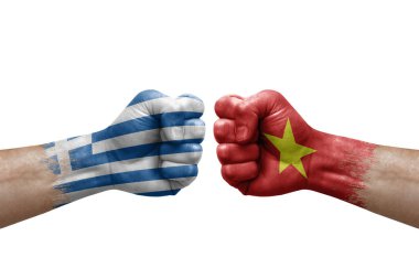 Two hands punch to each others on white background. Country flags painted fists, conflict crisis concept between greece and vietnam