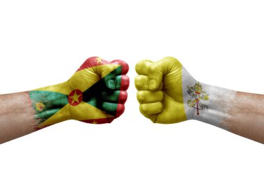 Two hands punch to each others on white background. Country flags painted fists, conflict crisis concept between grenada and holy see