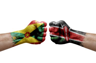 Two hands punch to each others on white background. Country flags painted fists, conflict crisis concept between grenada and kenya