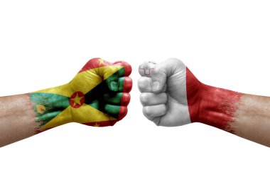 Two hands punch to each others on white background. Country flags painted fists, conflict crisis concept between grenada and malta