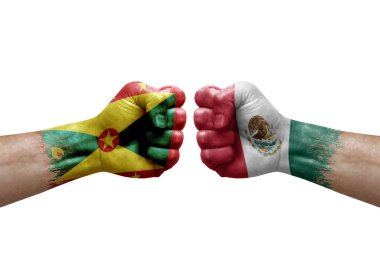 Two hands punch to each others on white background. Country flags painted fists, conflict crisis concept between grenada and mexico