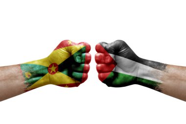 Two hands punch to each others on white background. Country flags painted fists, conflict crisis concept between grenada and palestine