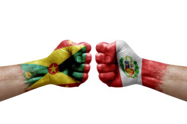 Two hands punch to each others on white background. Country flags painted fists, conflict crisis concept between grenada and peru