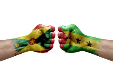 Two hands punch to each others on white background. Country flags painted fists, conflict crisis concept between grenada and sao tome and principe