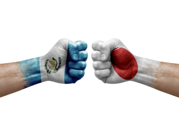 Two Hands Punch Each Others White Background Country Flags Painted — Stock fotografie